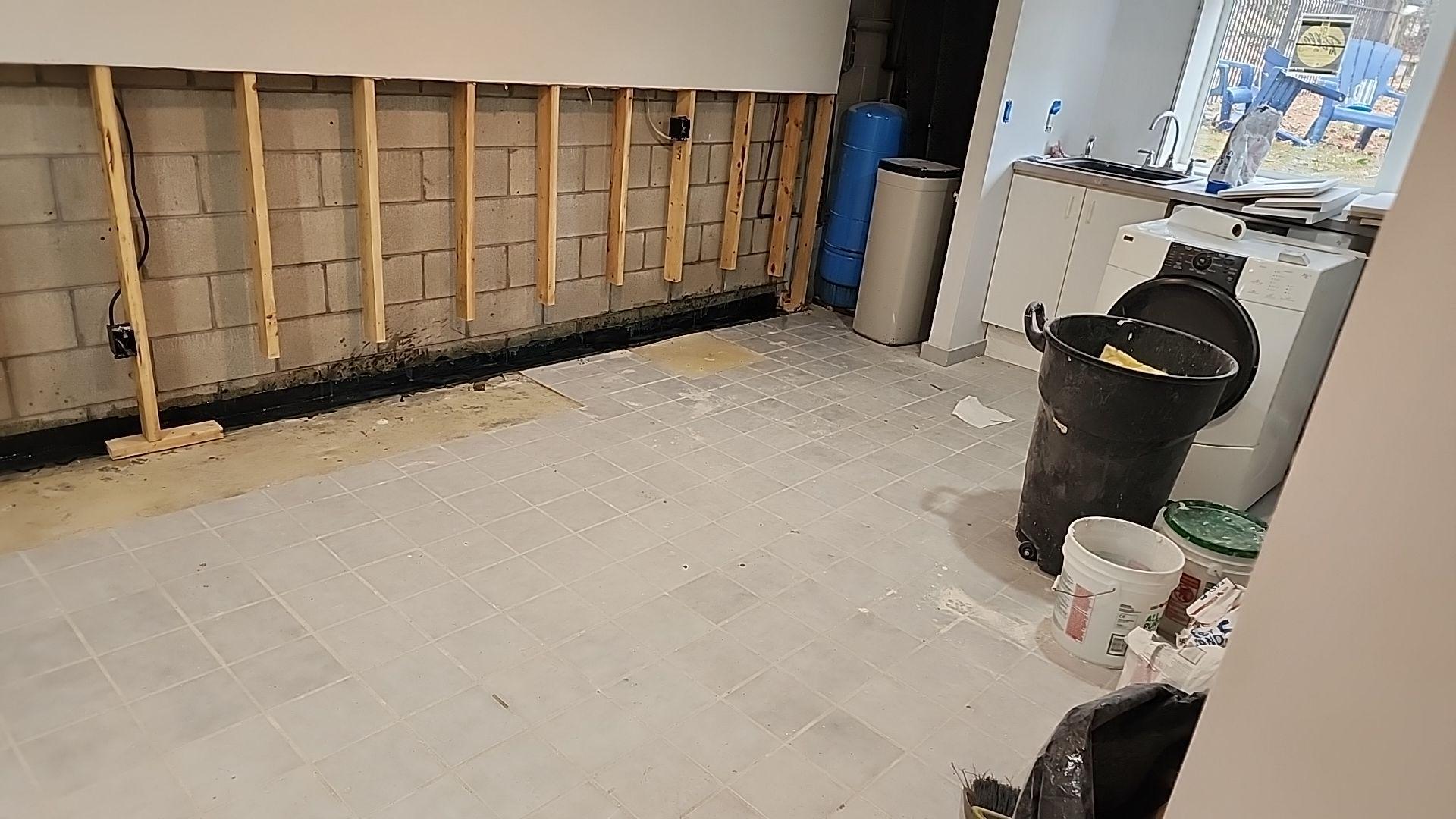 Expert technician performing crack repair on a residential home in Lowell, Michigan
