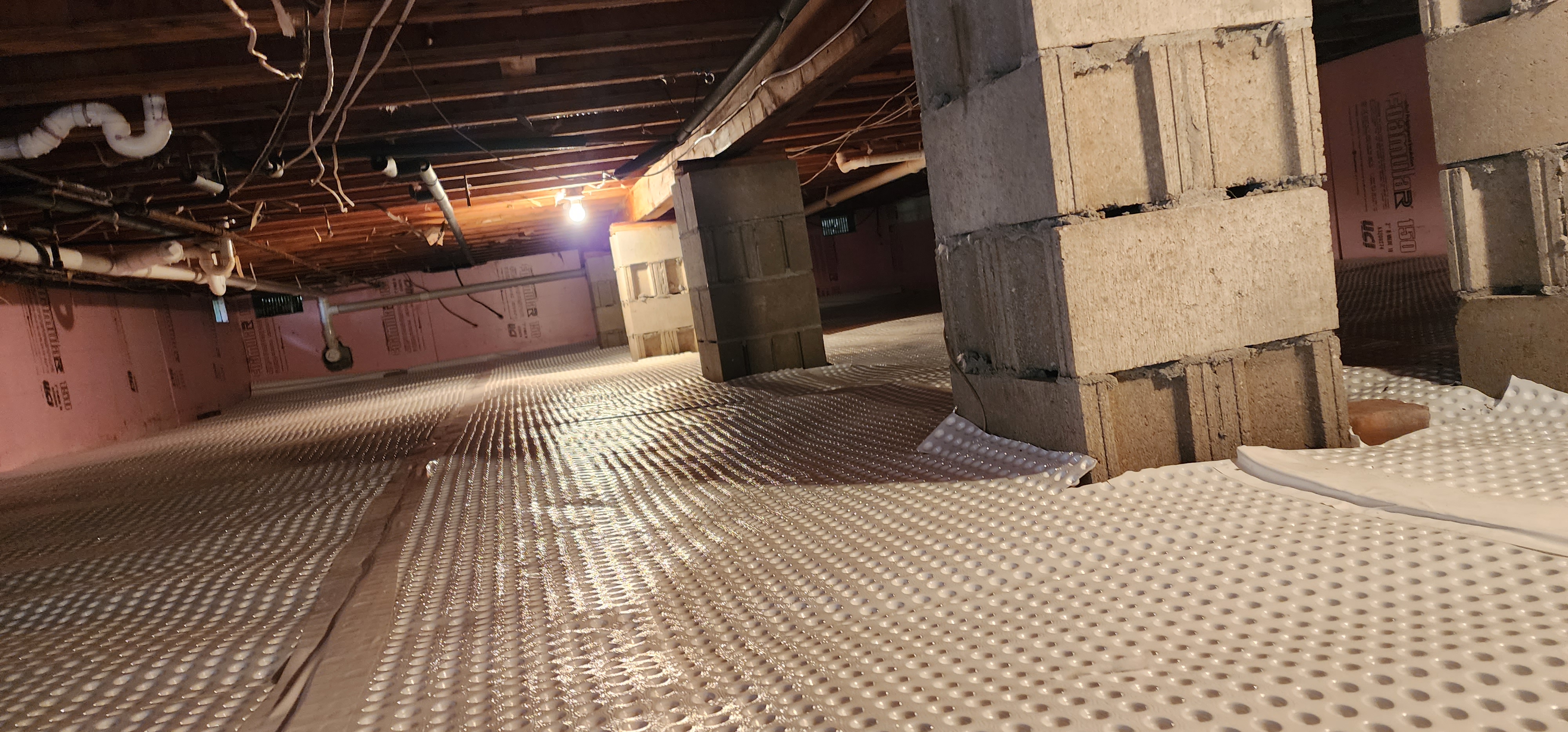 Image showing a well-encapsulated crawlspace in a home in Harrietta, Michigan.