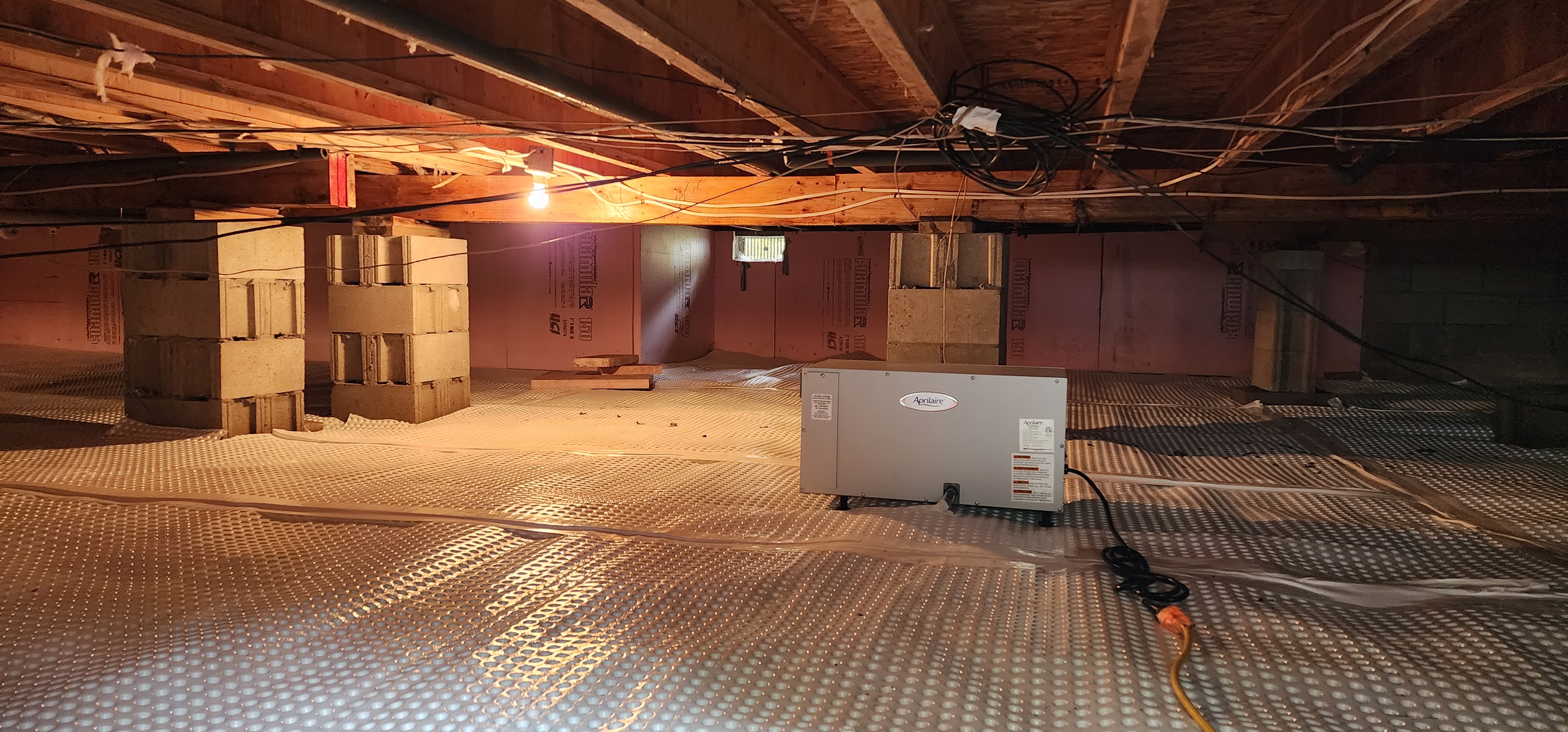 Crawlspace encapsulation process in a home in Dorr, Michigan