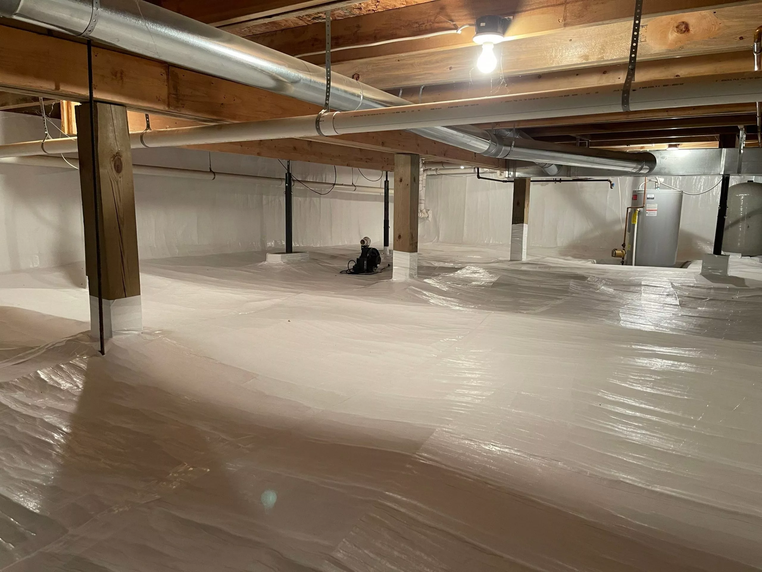 A sealed and insulated crawlspace illustrating successful encapsulation in Sparta, Michigan.