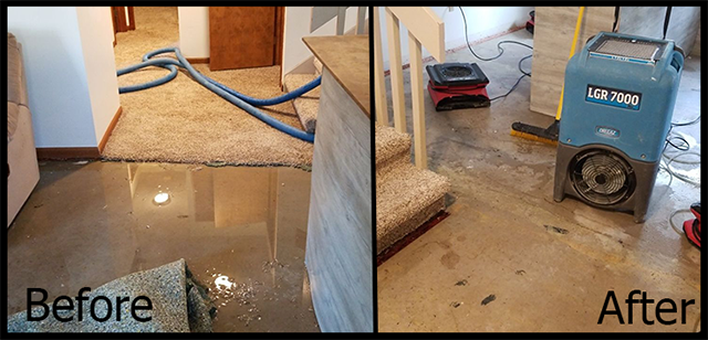A flooded basement in a Leland home with a restoration crew at work