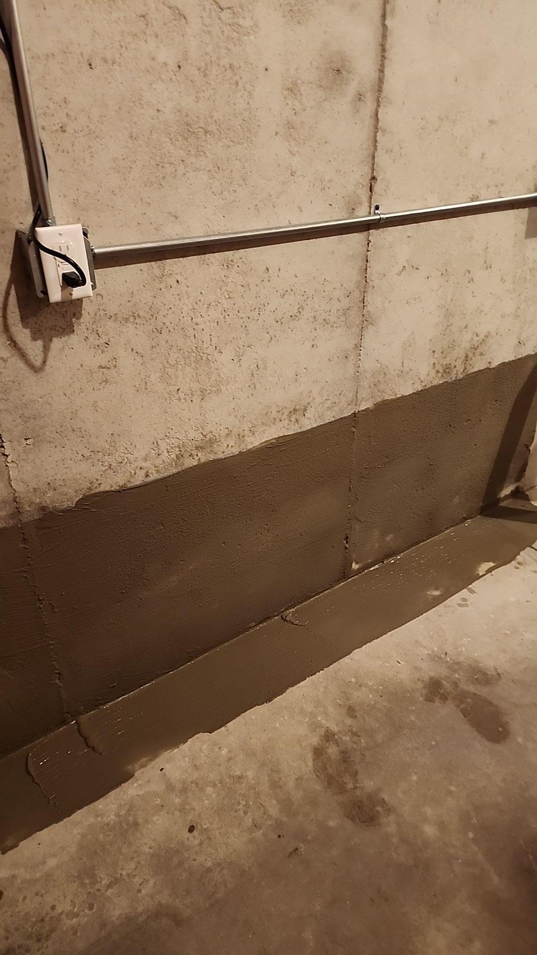A waterproofed basement in a Bay Shore, Michigan home, ready for flood protection.